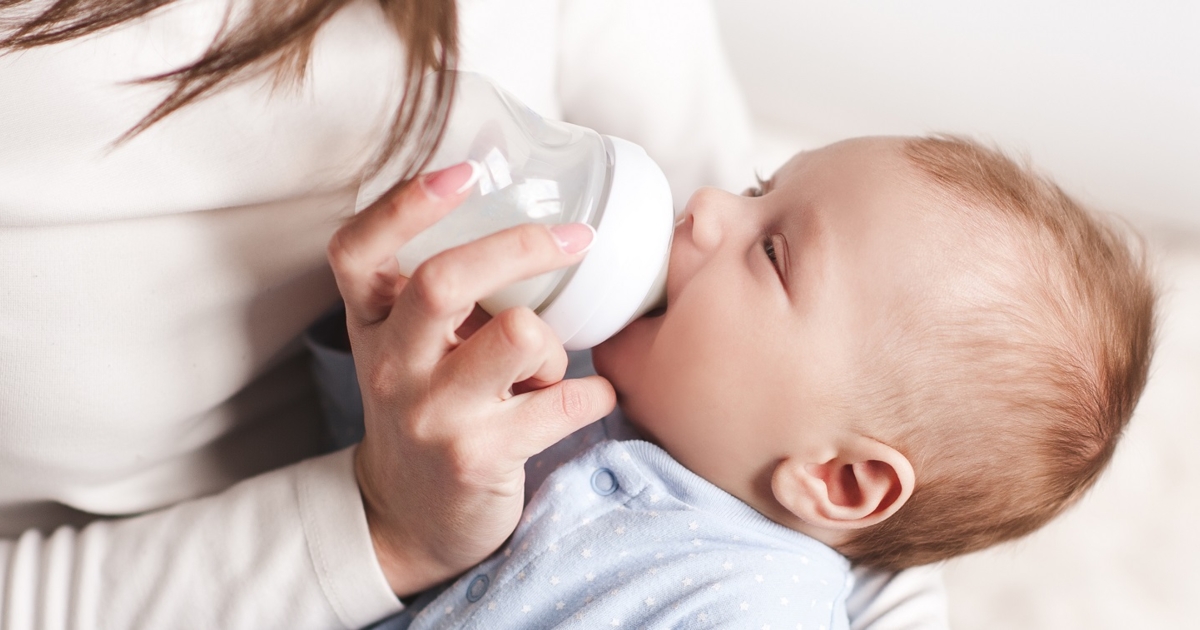 Bottle feeding best sale a baby